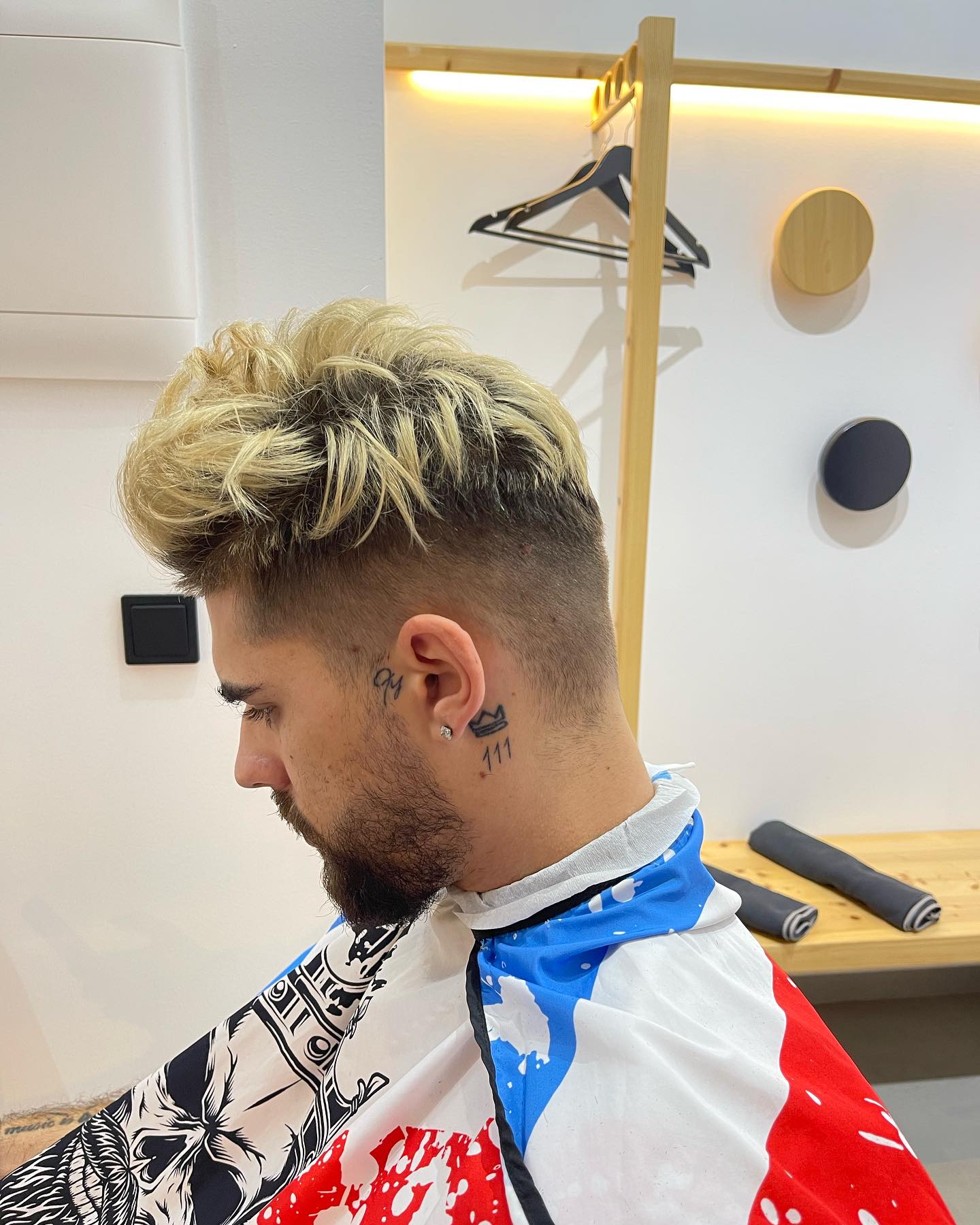 Textured blond haircut and fade